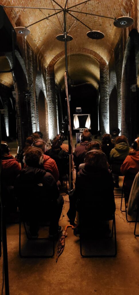 Audience listening to a spatial music performance with the Virtual Vienna Acousmonium