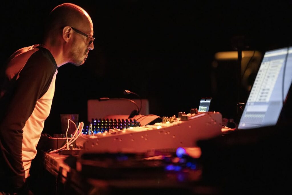 Amok, photo of Enrique Mendoza spatialising music